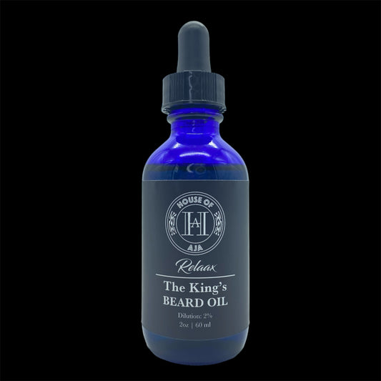 Close-up of House of Aja Beard Oil bottle with jojoba oil, argan oil, and essential oils for promoting beard growth