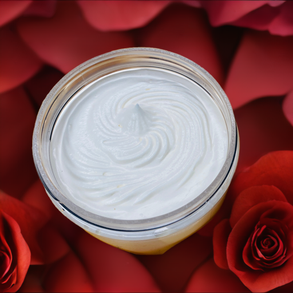 mango and avocado body butter that helps with PMS symptoms pictured here surrounded by roses