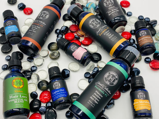 House of Aja essential oil blends, massage oils, and body butters for stress relief and relaxation, made with natural ingredients.