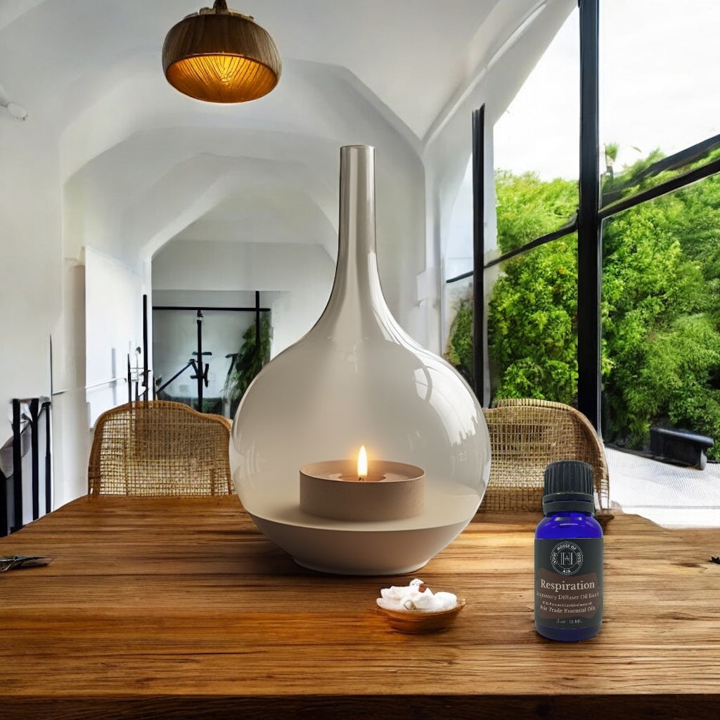 A calming scene with a diffuser and essential oil bottles for anxiety.