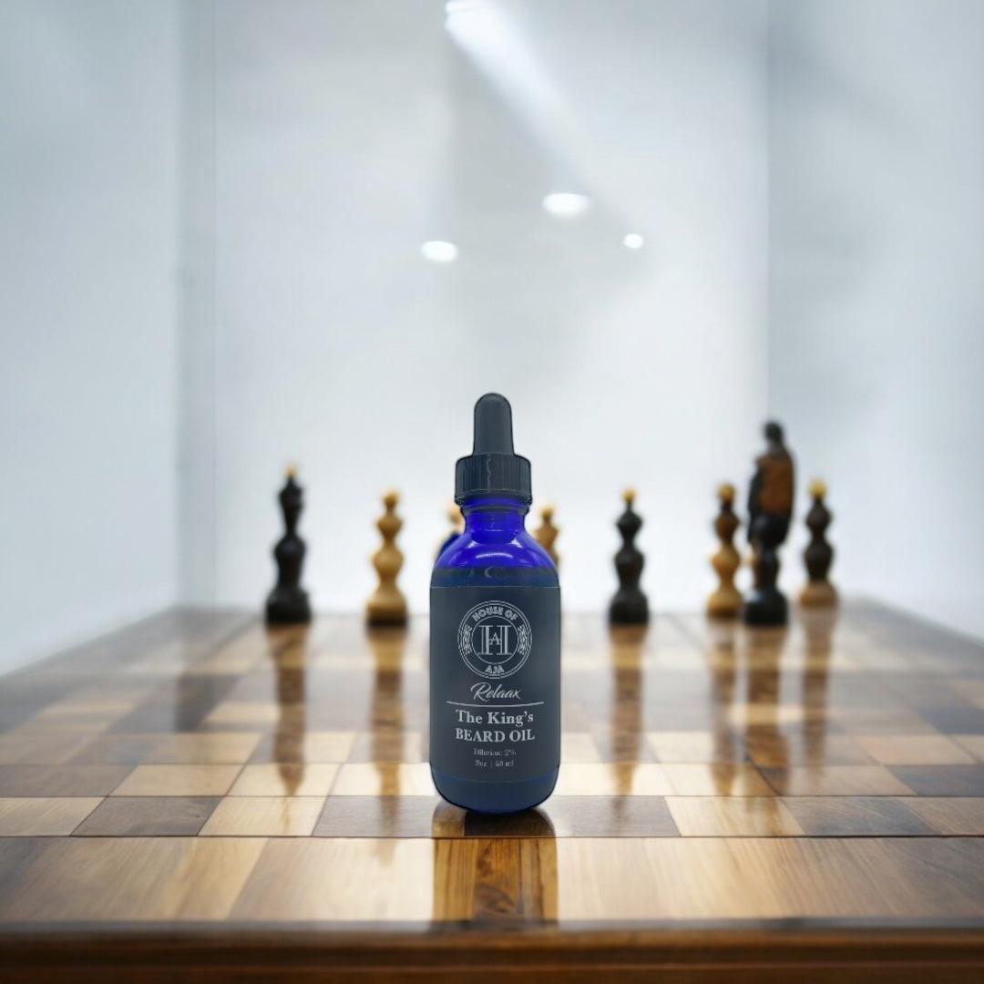 The King’s Aphrodisiac Beard Oil on a chess board, highlighting its premium quality as an essential grooming product.